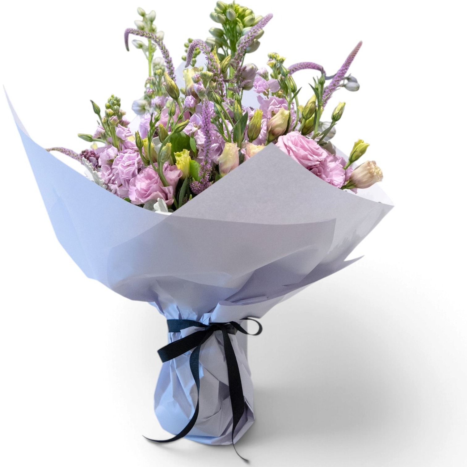 Soft pastel wrapped bouquet by Flower Daise